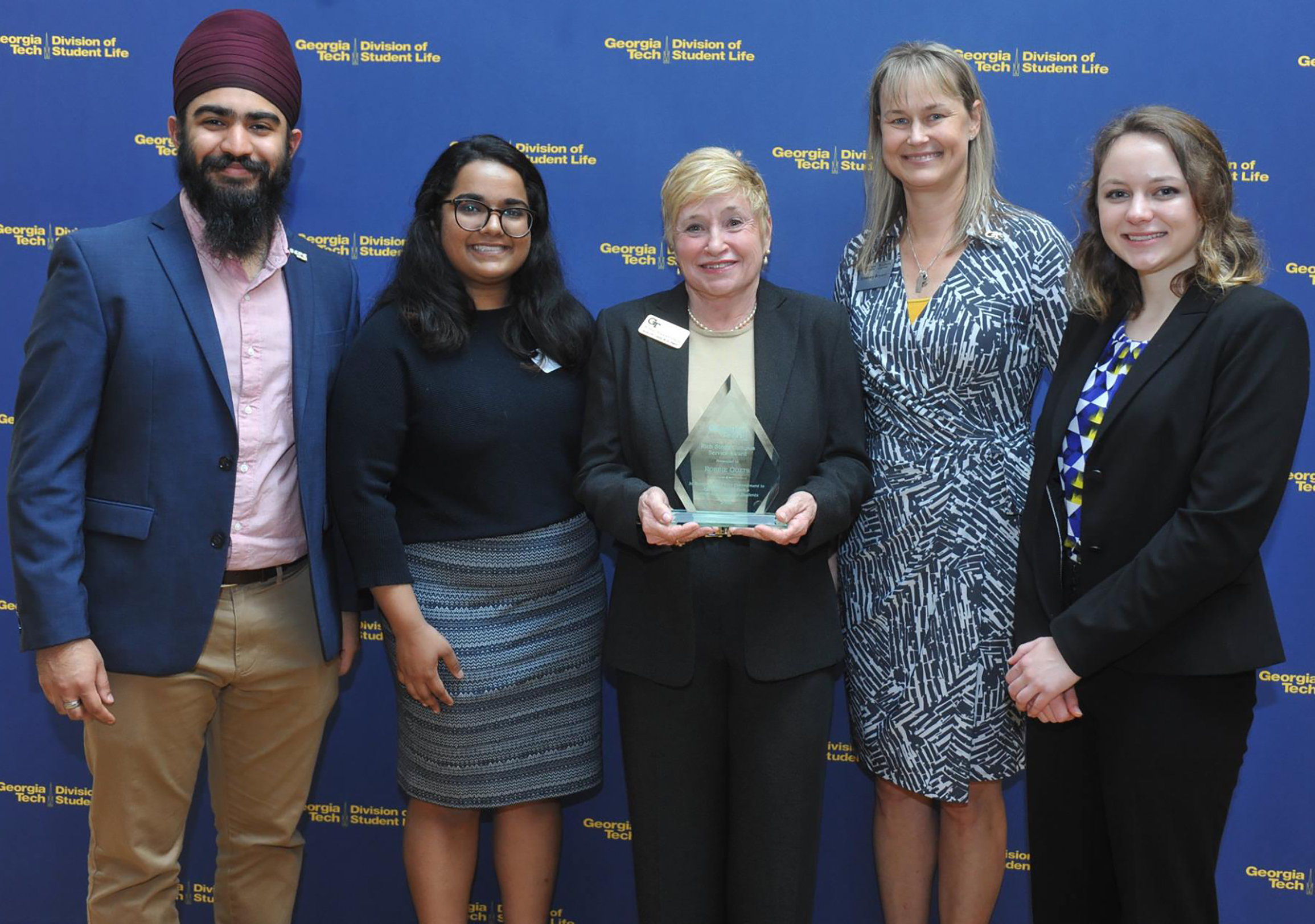 Robbie Ouzts received the 2018 Rich Steele Campus Services Award. Pictured (l-r) are Gurjote Sethi, Student Center Vice President of Finance; Sanjana Basker, Student Center President; Robbie Outzs, 2018 Rich Steele Campus Services award recipient; Lindsay Bryant, Senior Director of the Student Center; and Katie Hampton, Student Center Vice President of Recruitment.